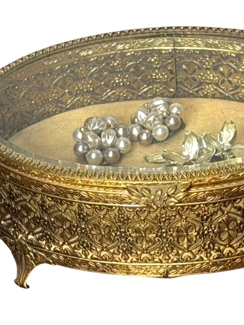 Vintage Hollywood Regency style brass filigree jewelry box with beveled glass to